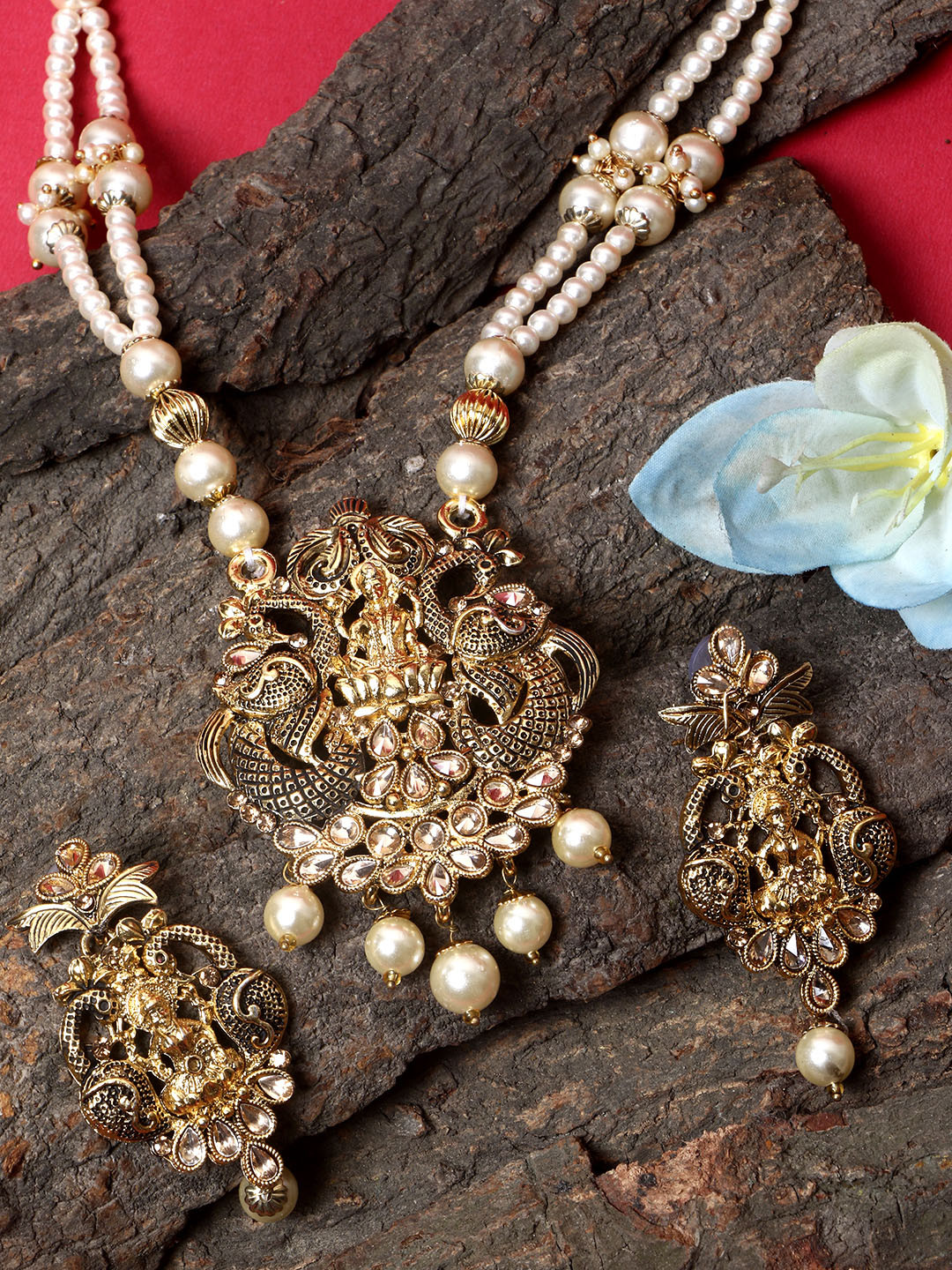 ANIKAS CREATION Women Gold-Plated Black & Gold Stone Studded Pearl Temple Jewellery Set