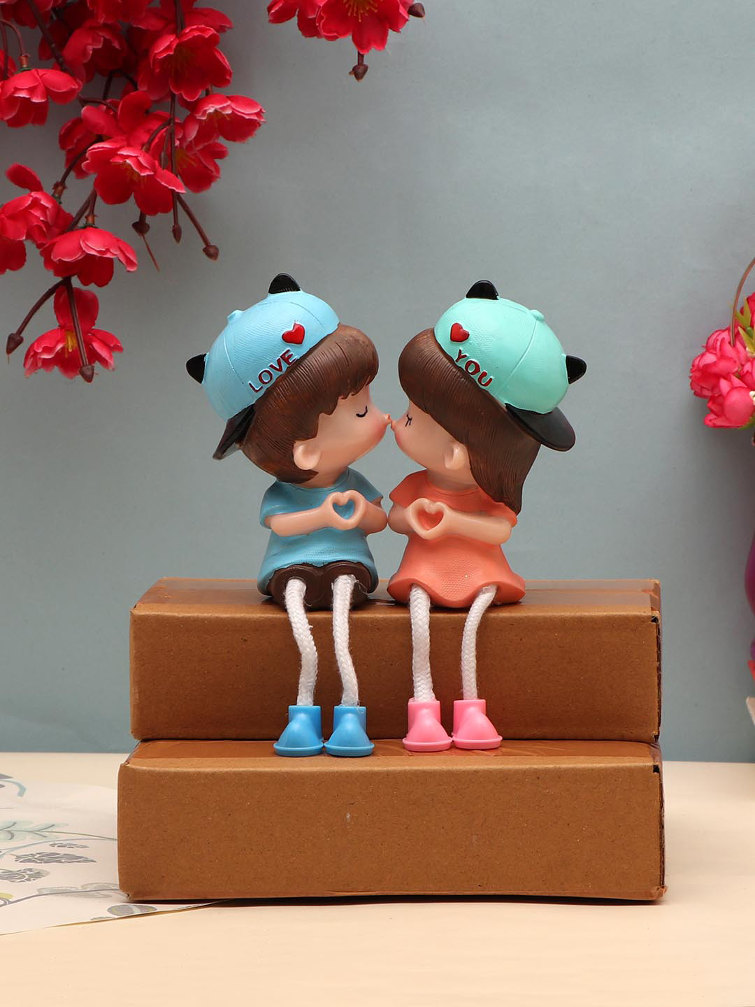 TIED RIBBONS Romantic Couple Multicoloured Polyresin Glossy Living Room Small Showpiece - 6.7 Inches