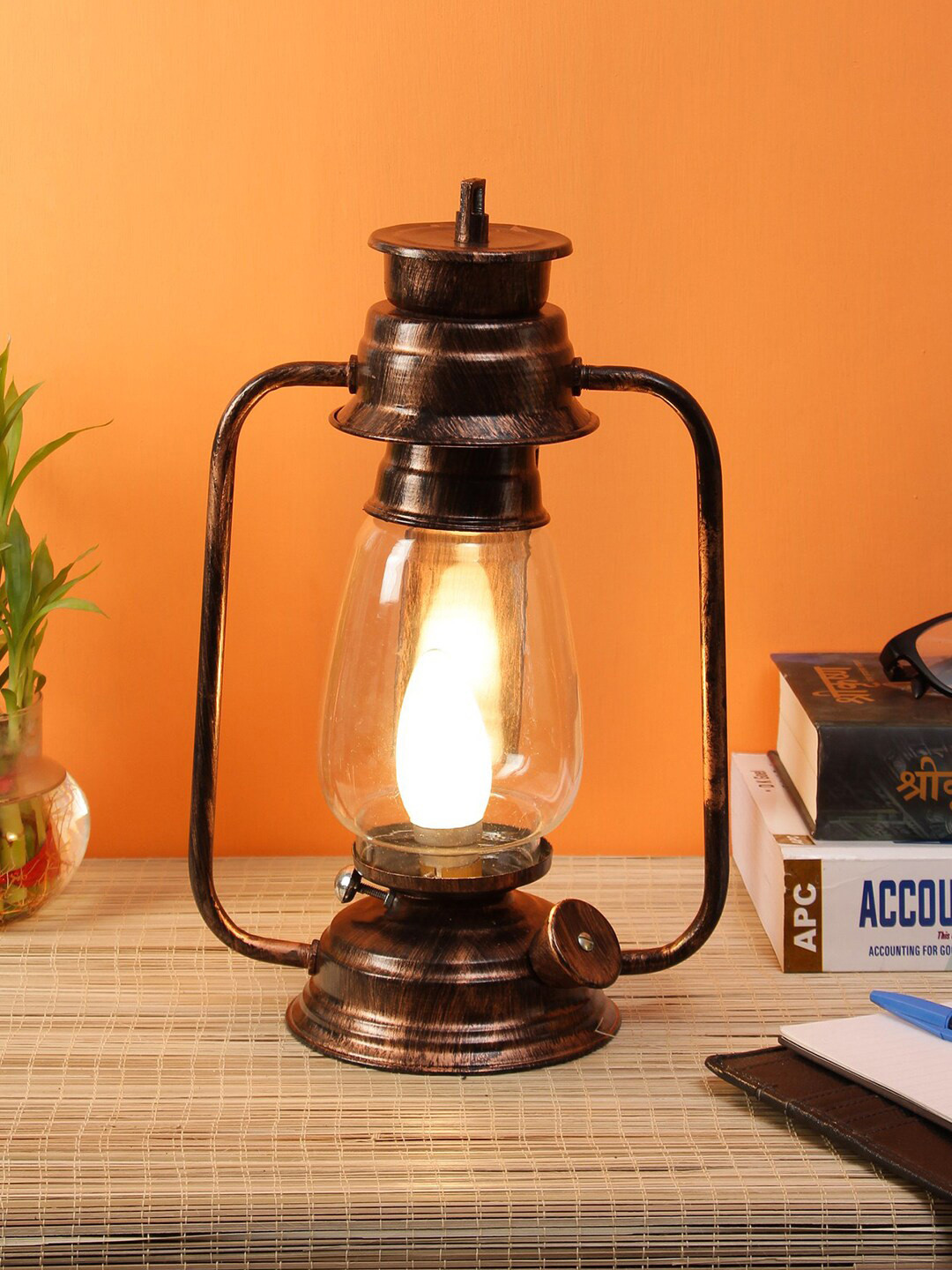 Devansh Copper-Toned Solid Clear Glass Table Lantern