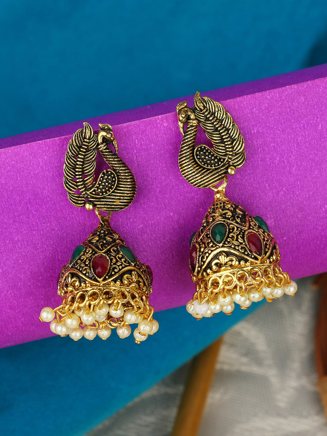 ANIKAS CREATION Gold-Plated Pearl Peacock Shaped Jhumkas