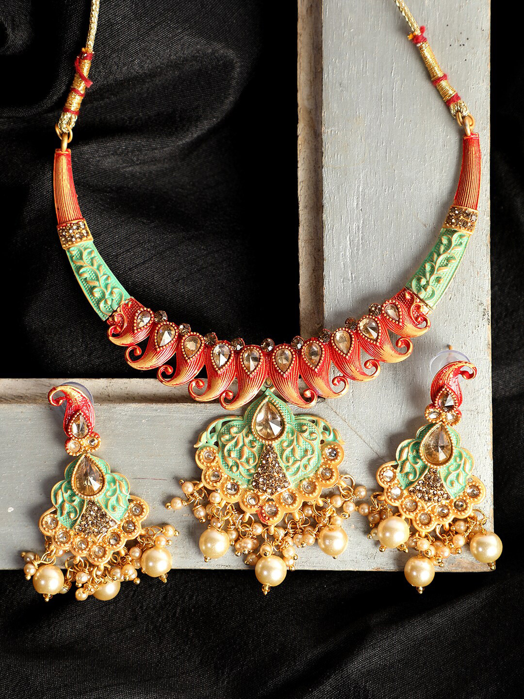 ANIKAS CREATION Gold-Plated Sea Green & Red Enamelled Stone-Studded Traditional Jewellery Set