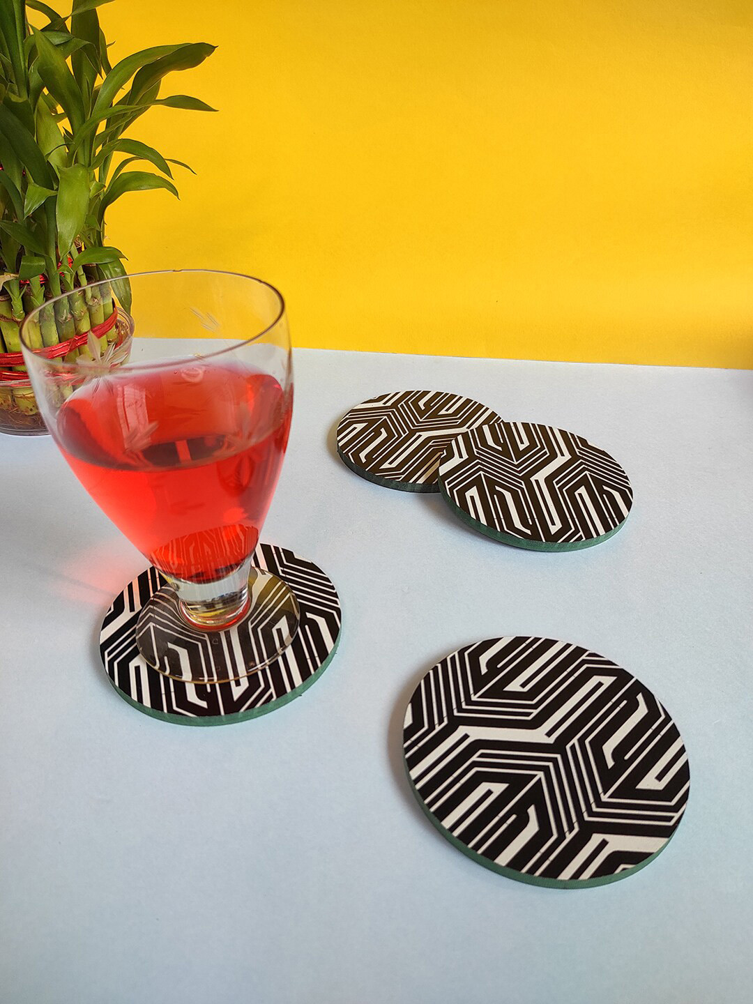 CRAYTON Set Of 4 Black & White Geometric Print Round Wooden Coasters