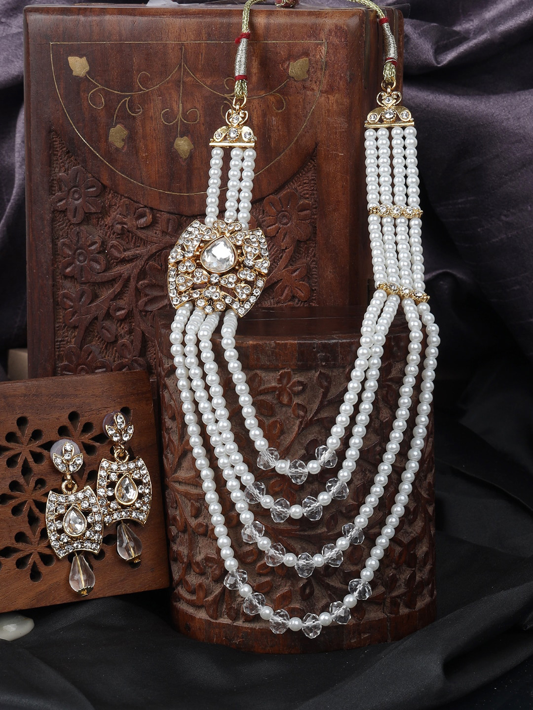ANIKAS CREATION Gold-Plated & White Stone Studded Handcrafted Traditional Rajwada Side Broch Multi Strand Jewellery Set