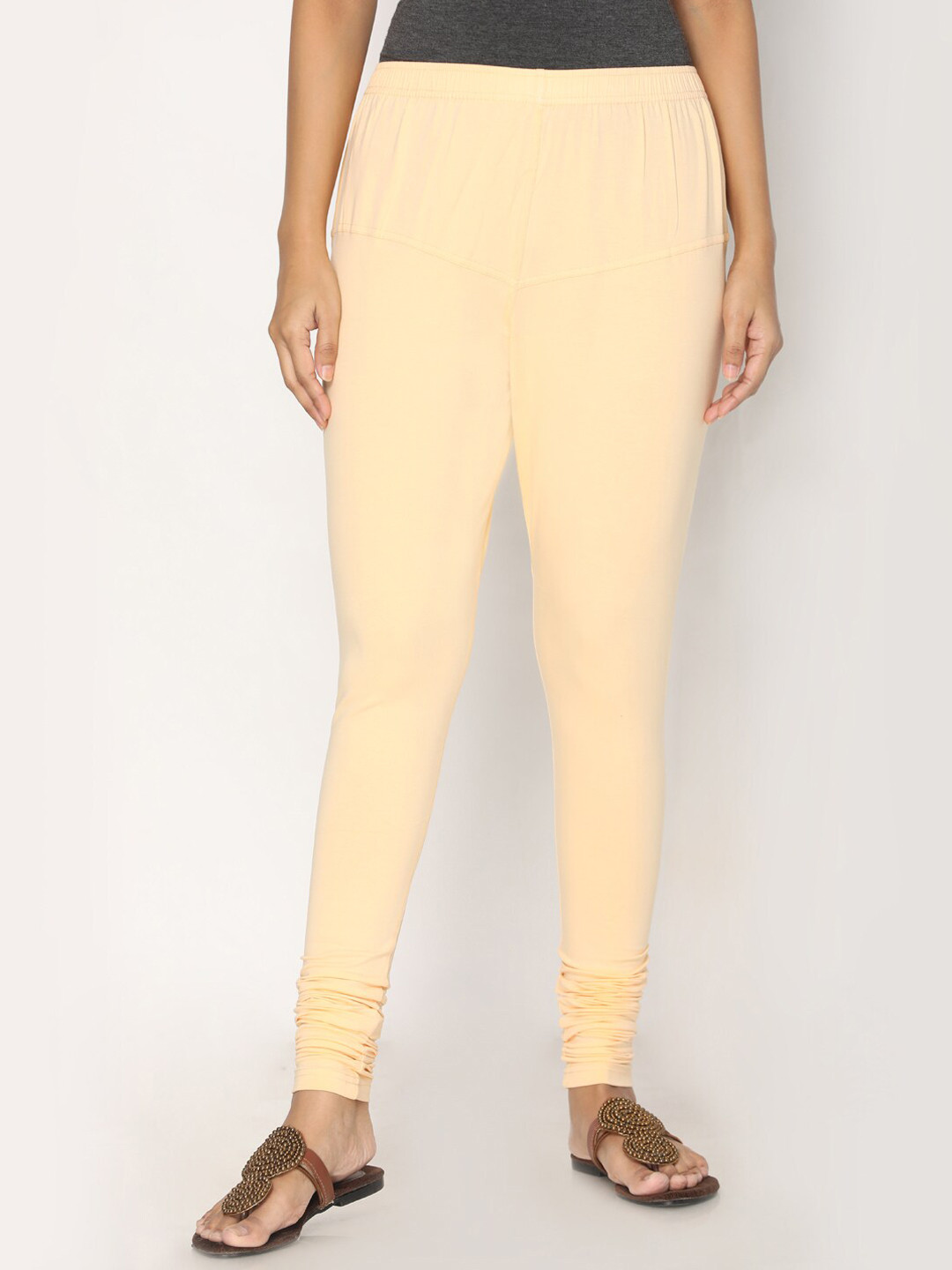 TSG Bliss Women Peach-Colored Solid Churidar-Length leggings