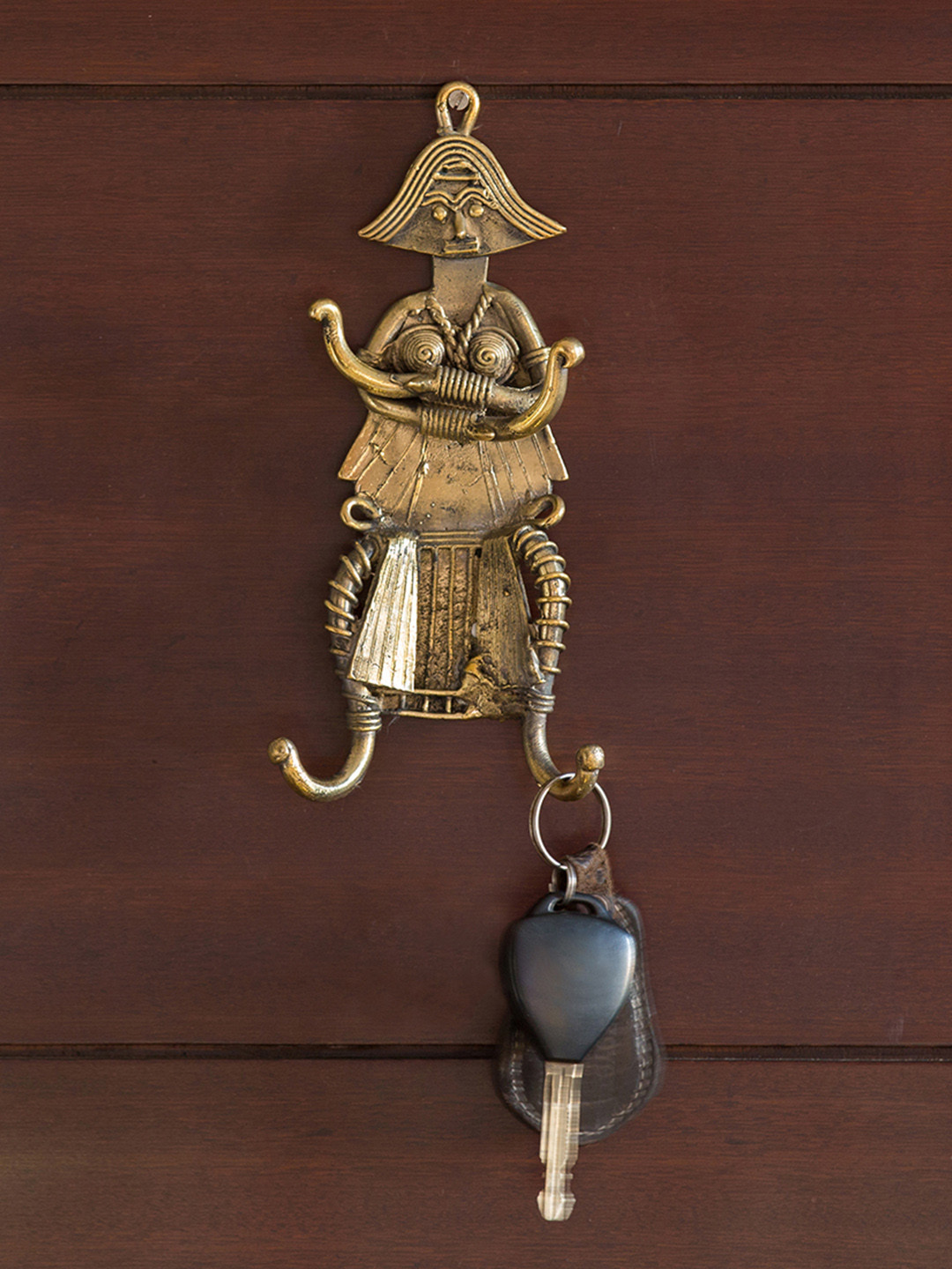 ExclusiveLane Gold-Toned Dokhra Art Handcrafted Tribal Warrior Brass Key Holders