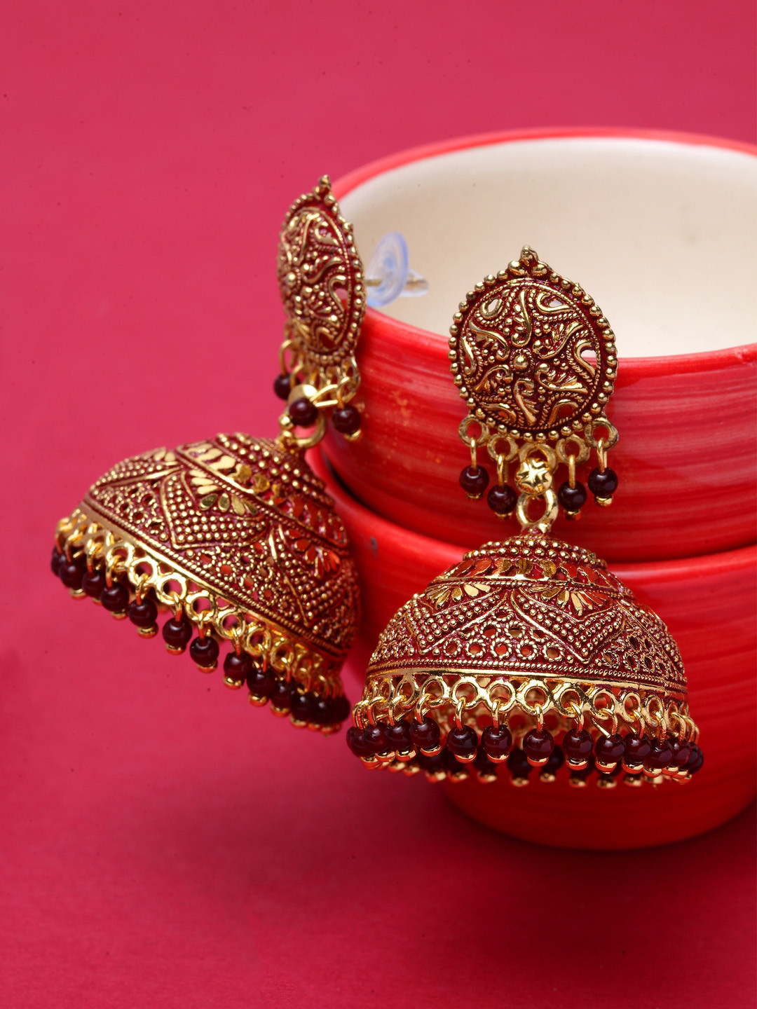 ANIKAS CREATION Gold Plated & Maroon Jhumkas