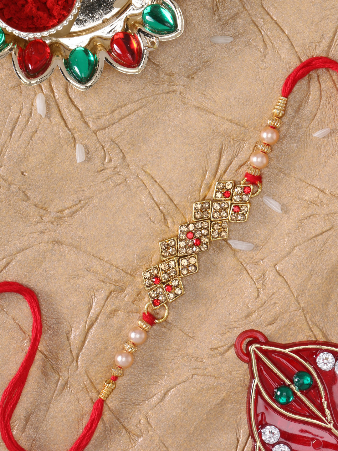 LIVE EVIL Men Gold-Toned & Red Alloy Gold-Plated Handcrafted Wraparound Rakhi