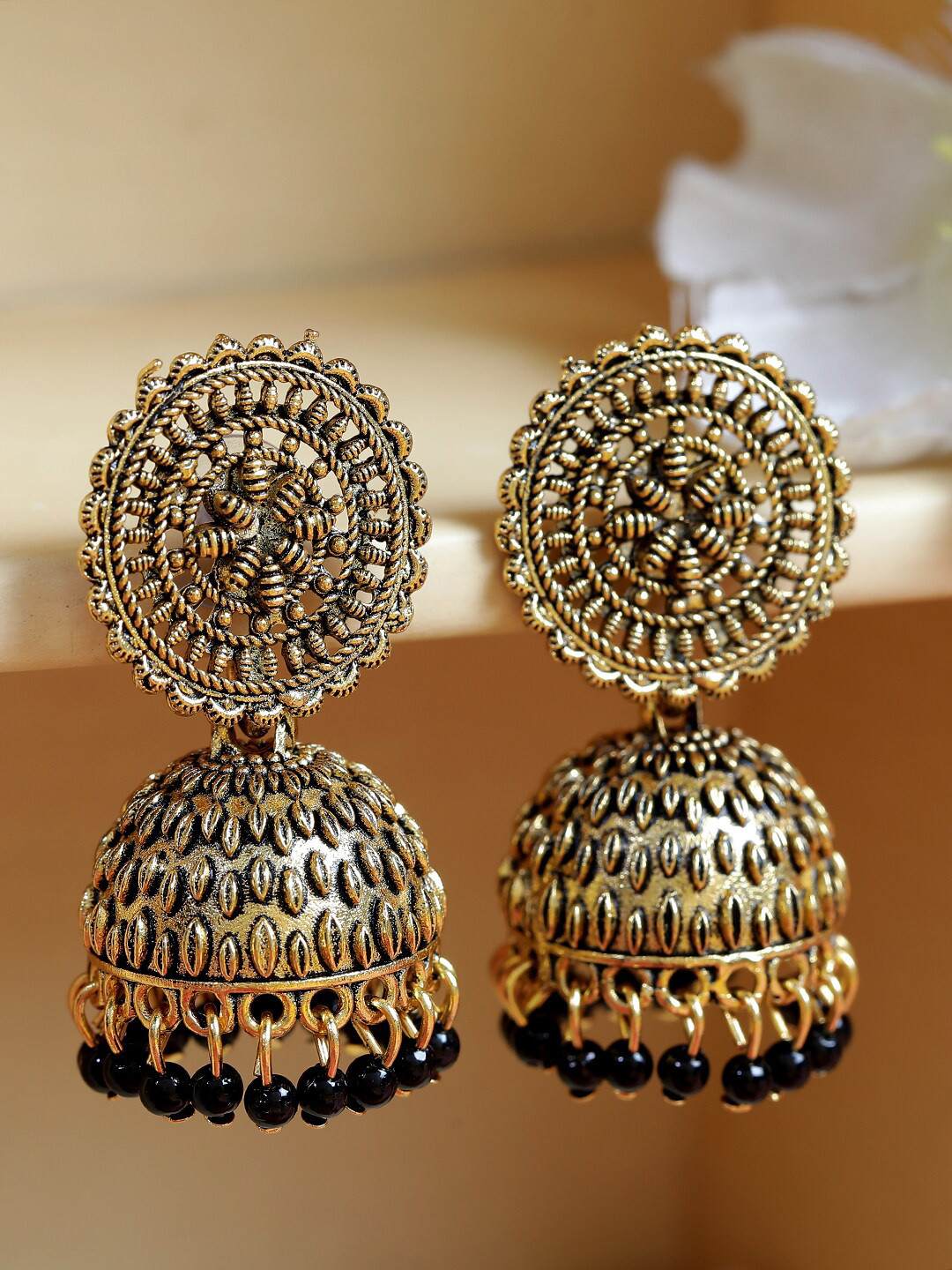 ANIKAS CREATION Black & Gold Dome Shaped Jhumkas