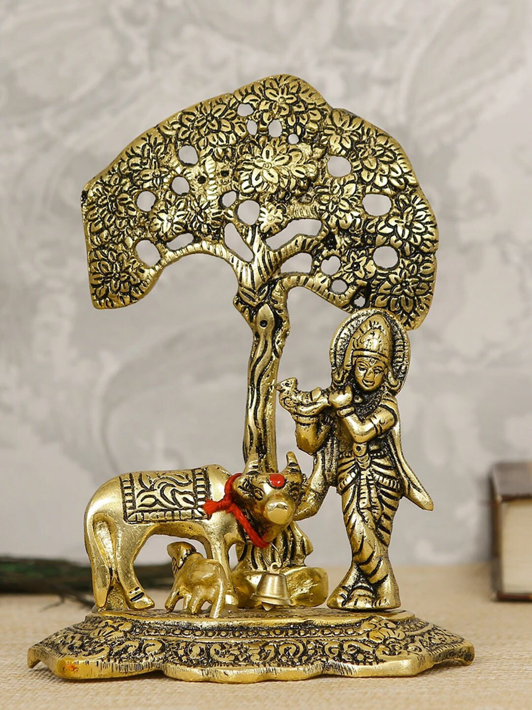 TIED RIBBONS Krishna Playing Flute with Kamdhenu Cow Standing Under Tree Gold Brass Metallic Prayer Room Small Showpiece - 6.7 Inches