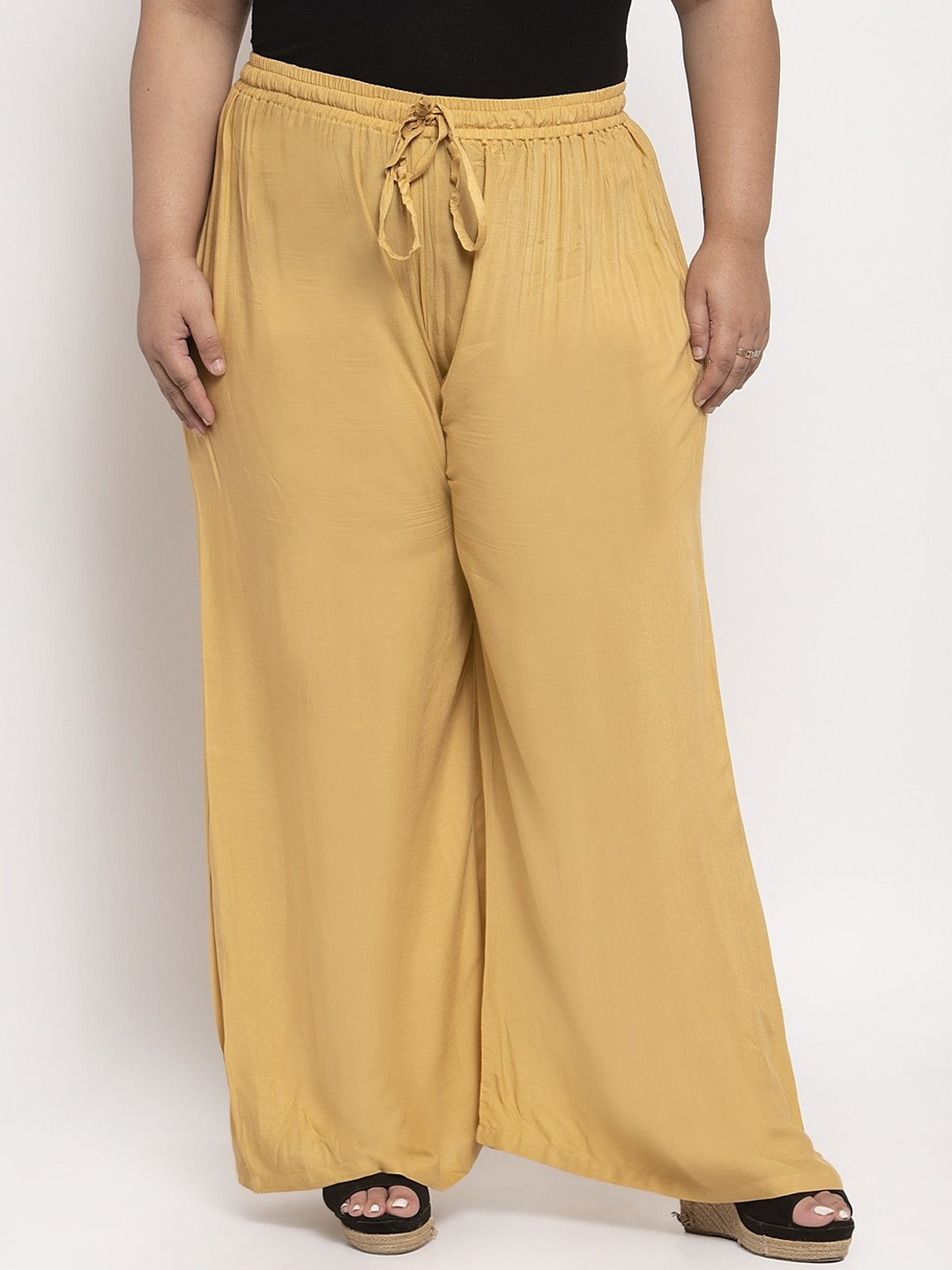 TAG 7 PLUS Women Beige Solid Flared Palazzo