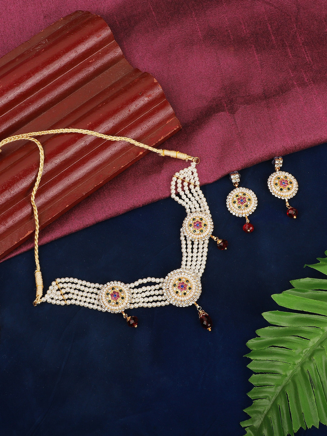 ANIKAS CREATION Gold-Plated White & Maroon Stone Studded Pearl Beaded Jadau Choker Jewellery Set