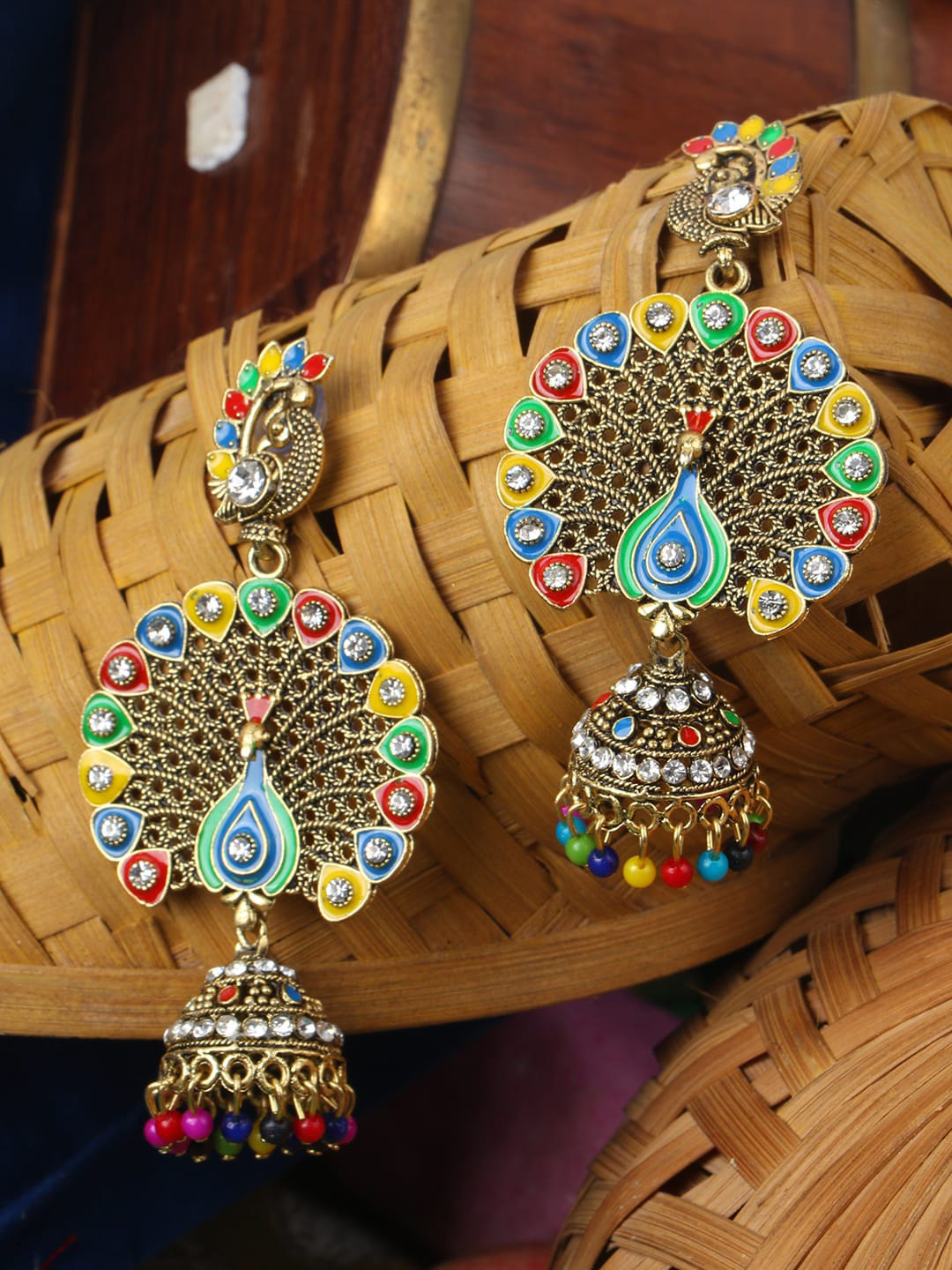 ANIKAS CREATION Blue & Red Gold-Plated Peacock Shaped Jhumkas