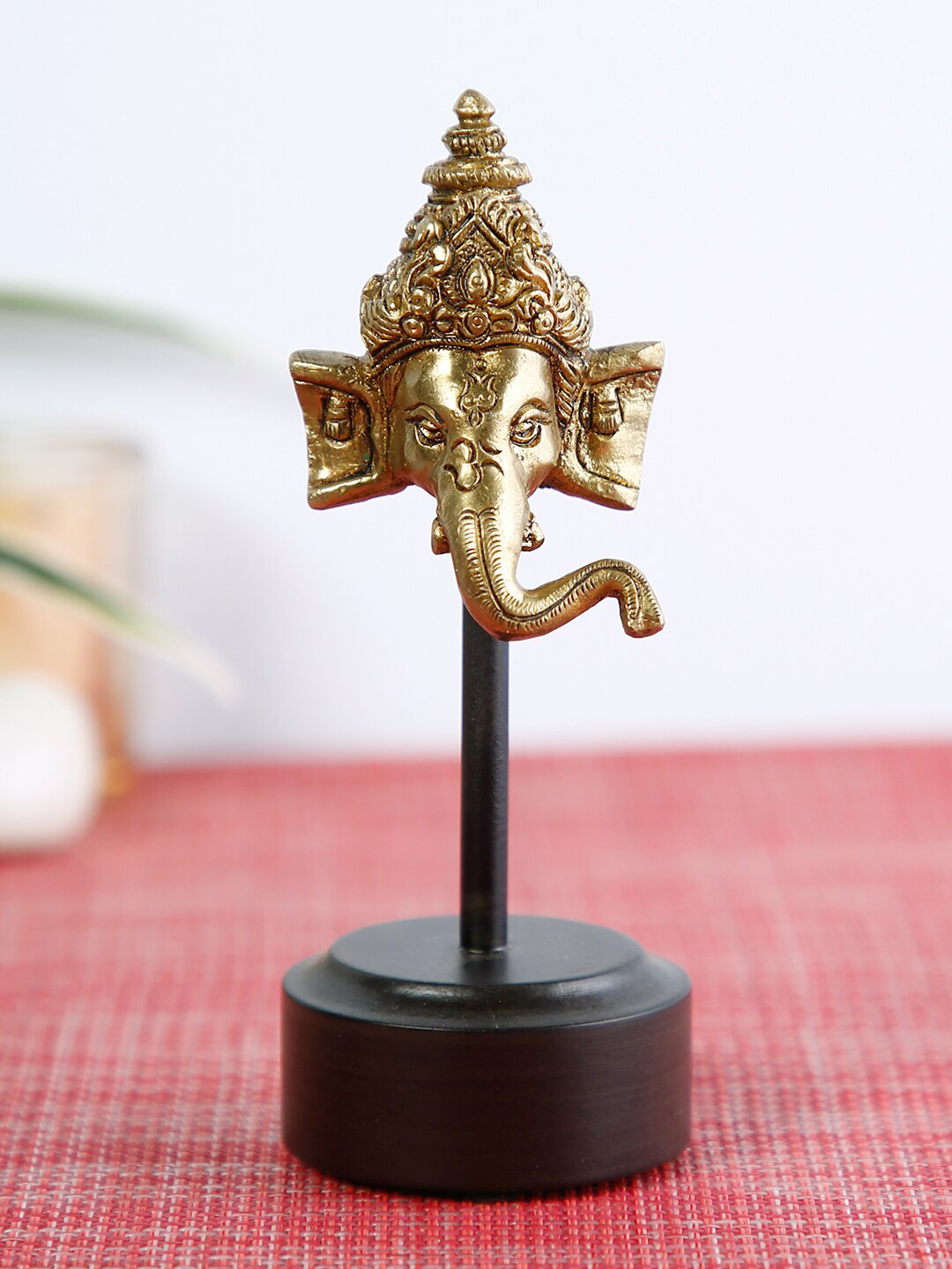 CraftVatika Gold-Toned & Black Lord Ganesh Idol Showpiece
