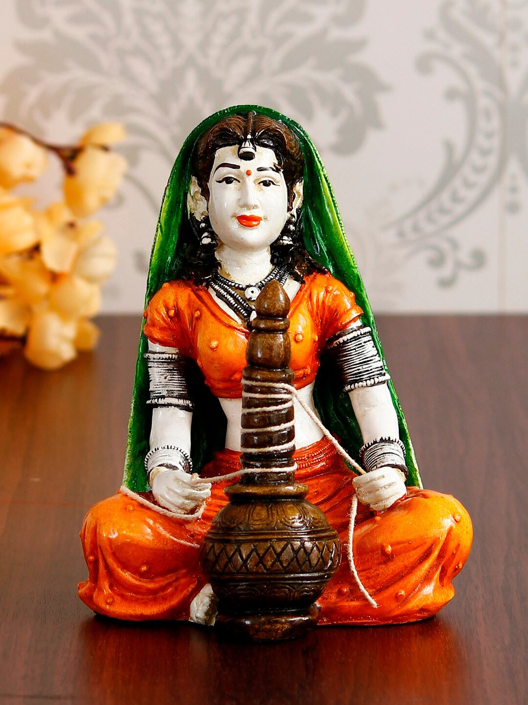 eCraftIndia Rajasthani Lady Preparing Makkhan Orange Polyresin Glossy Living Room Hand-Crafted Small Showpiece - 6.7 Inches