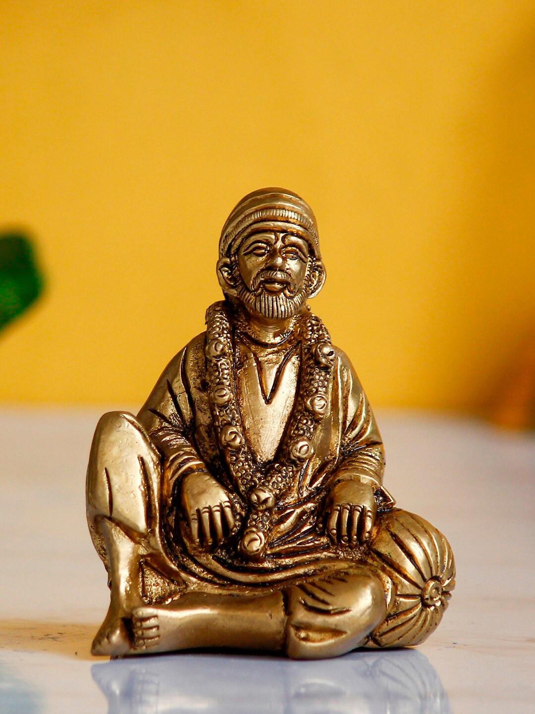 eCraftIndia Sitting Sai Baba Gold Brass Metallic Prayer Room Hand-Crafted Tiny Showpiece - 3.3 Inches