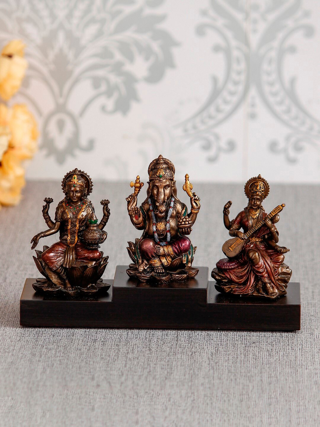 eCraftIndia Ganesha Laxmi Saraswari Brown Polyresin Natural Prayer Room Small Showpiece - 4.5 Inches
