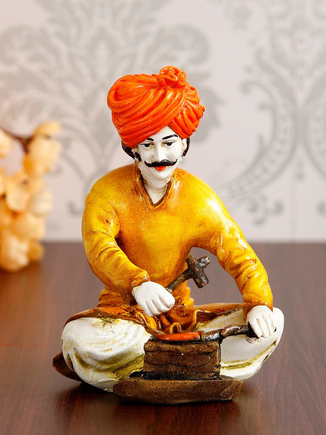 eCraftIndia Rajasthani Men Working with Hammer Yellow Polyresin Glossy Living Room Hand-Crafted Small Showpiece - 7.5 Inches