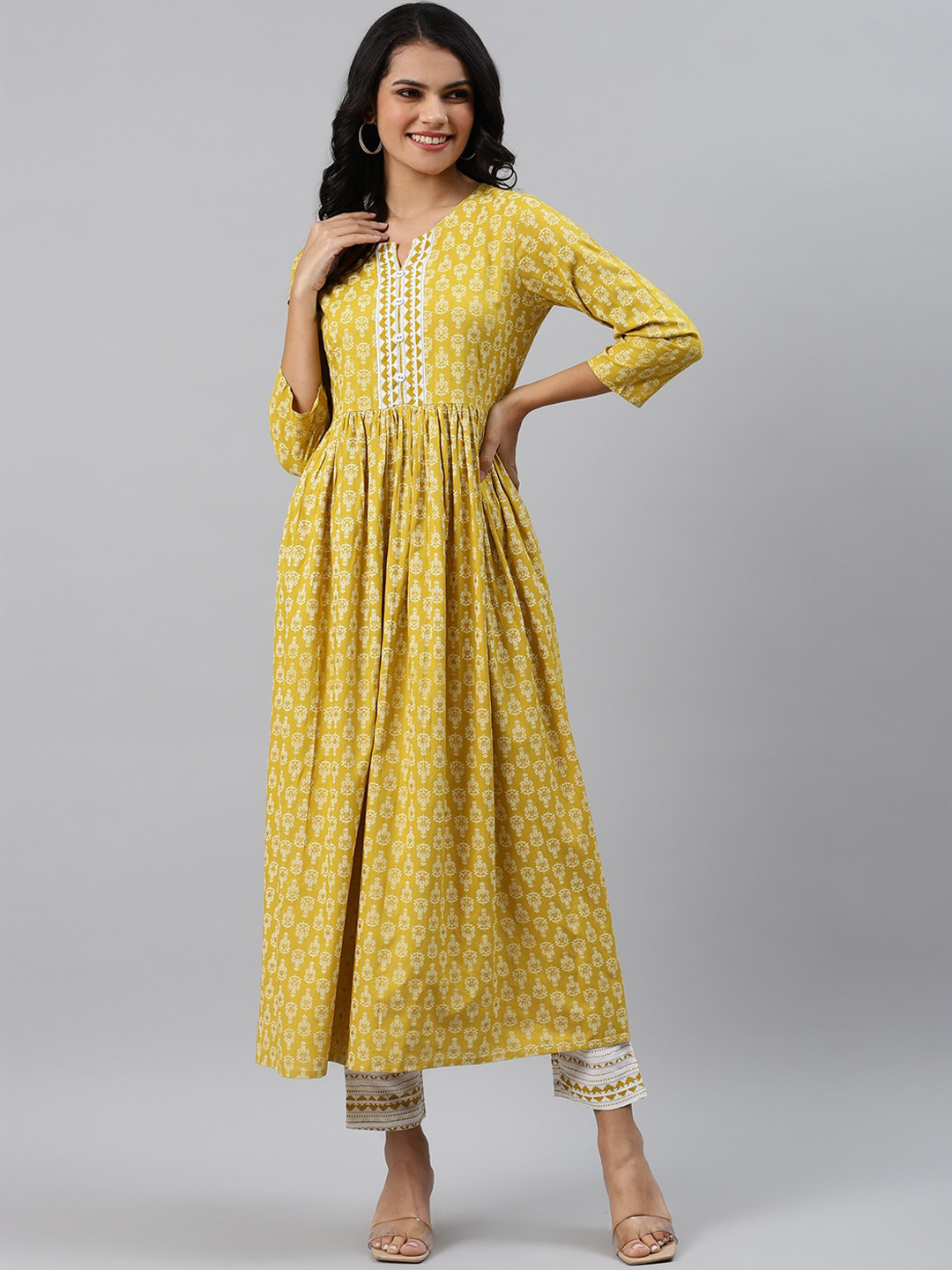Sringam Women Yellow Printed Kurta with Churidar