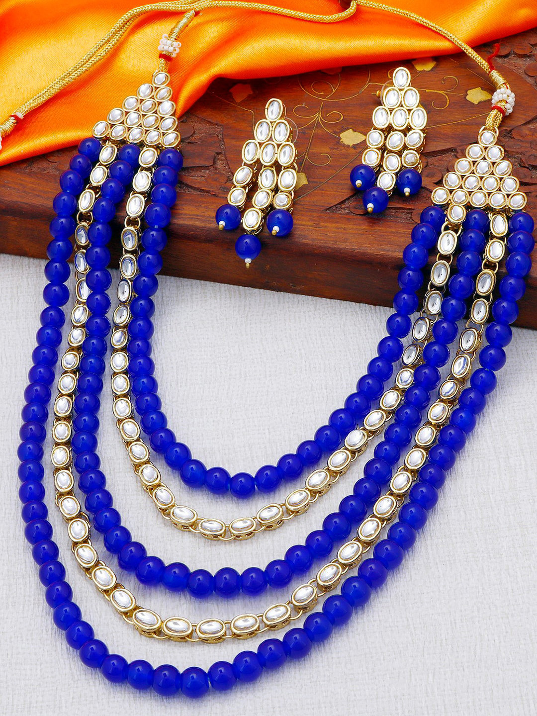 Sukkhi Gold-Plated Blue & White Kundan-Studded Beaded Haram Jewellery Set