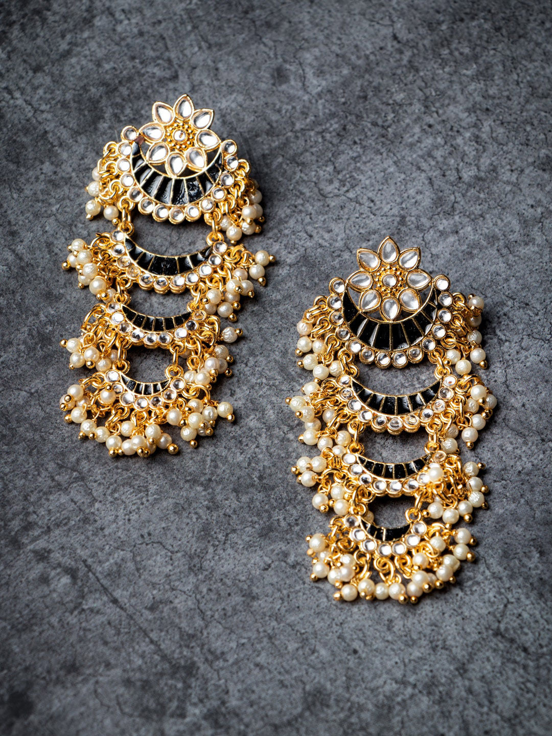 MORKANTH JEWELLERY Gold Pleated Black Kundan Studded Contemporary Drop Earrings