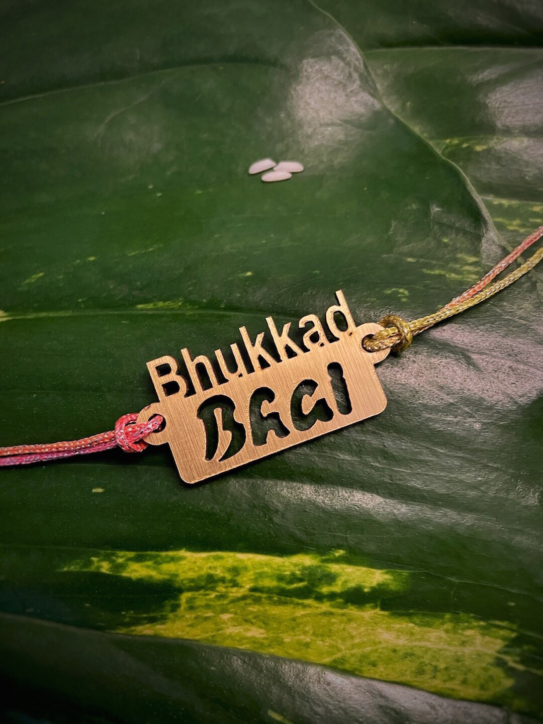 Digital Dress Room Gold-Toned Funky Slogan Bhukkad Bhai Mauli Rakhi