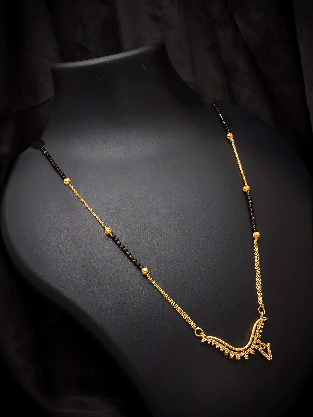 aadita Gold-Plated Black & White Stone-Studded Alphabet Initials Letter V Mangalsutra