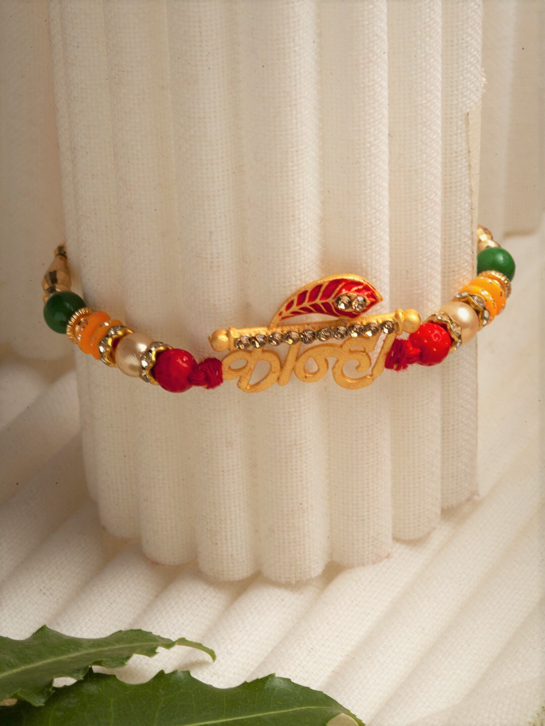 PANASH Gold-Toned Pearl Beaded Rakhi With Roli Chawal
