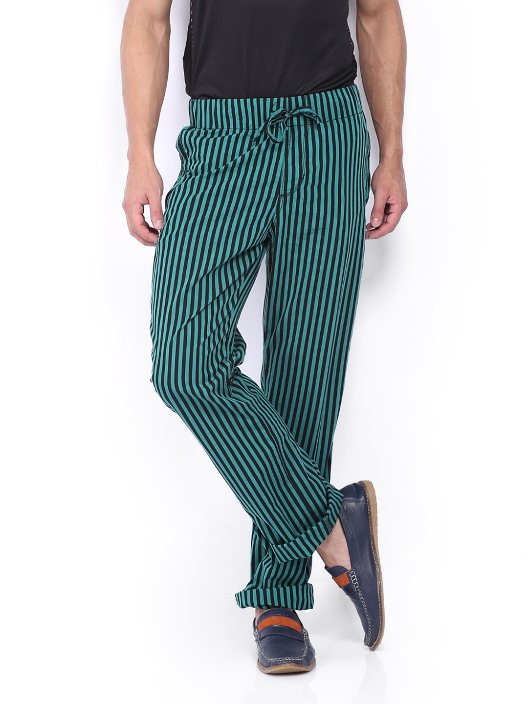 green and black striped pants