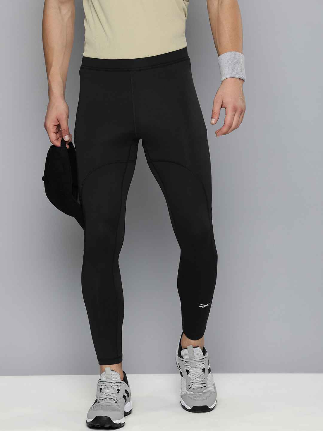 Buy Reebok Men Black Solid SPEEDWICK Tights Apparel for Men