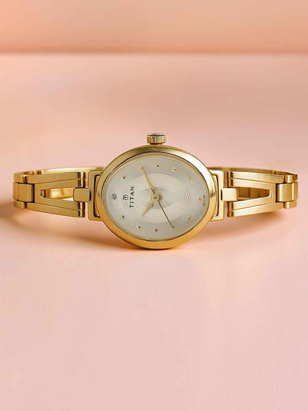 Titan Karishma Quartz Analog Champagne Dial Watch