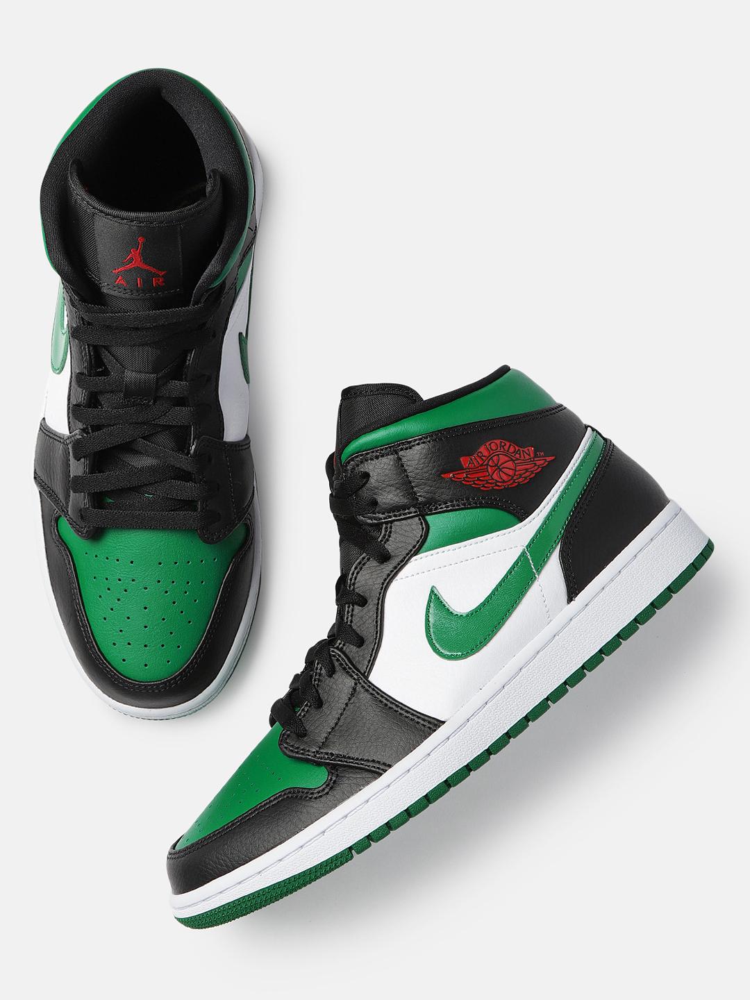 men green and black jordans