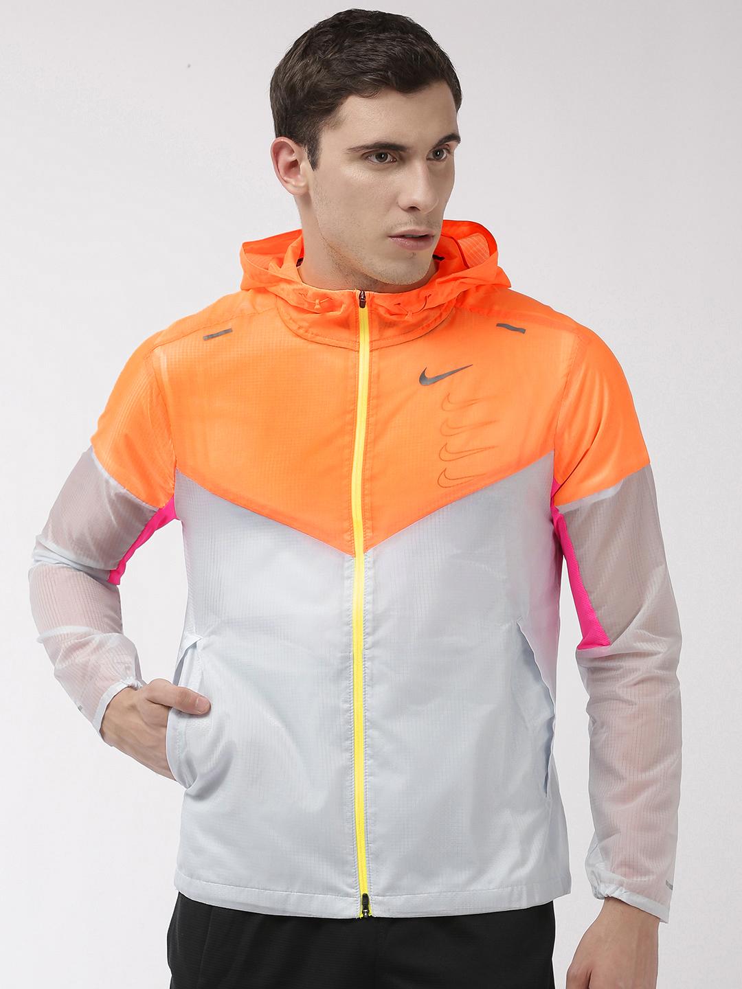 grey and orange nike windbreaker