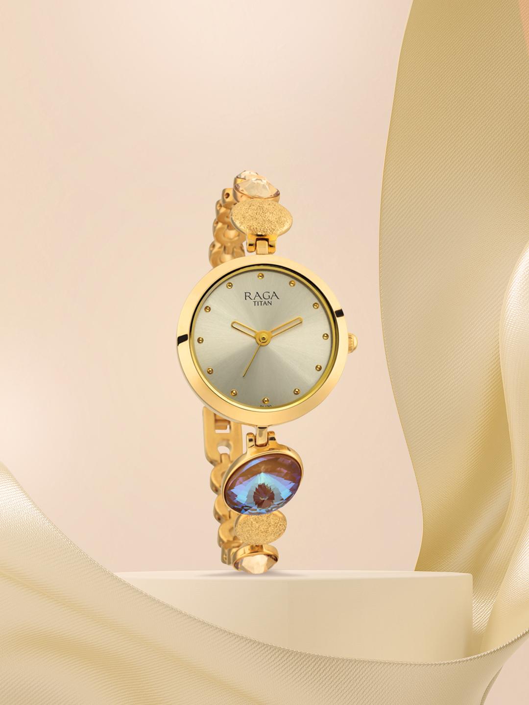Buy Titan Raga Moments Of Joy Quartz Analog With Champagne Dial