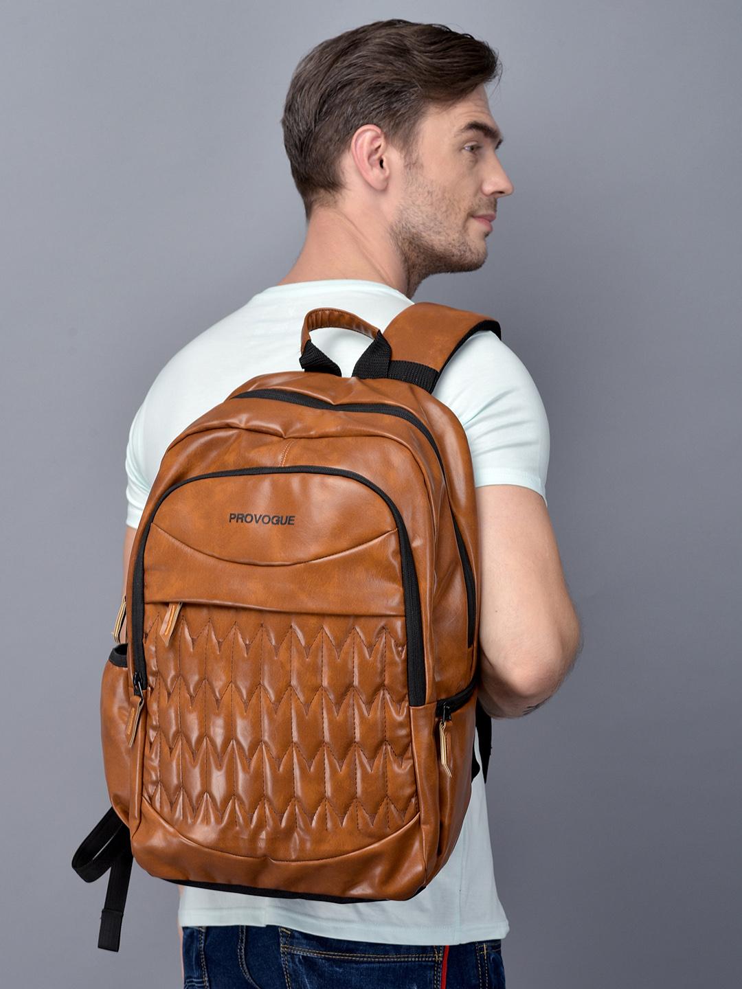 CH Logo Tan and Black Backpack COACH® CH | Taylor Small Backpack In Signature Canvas main image 2
