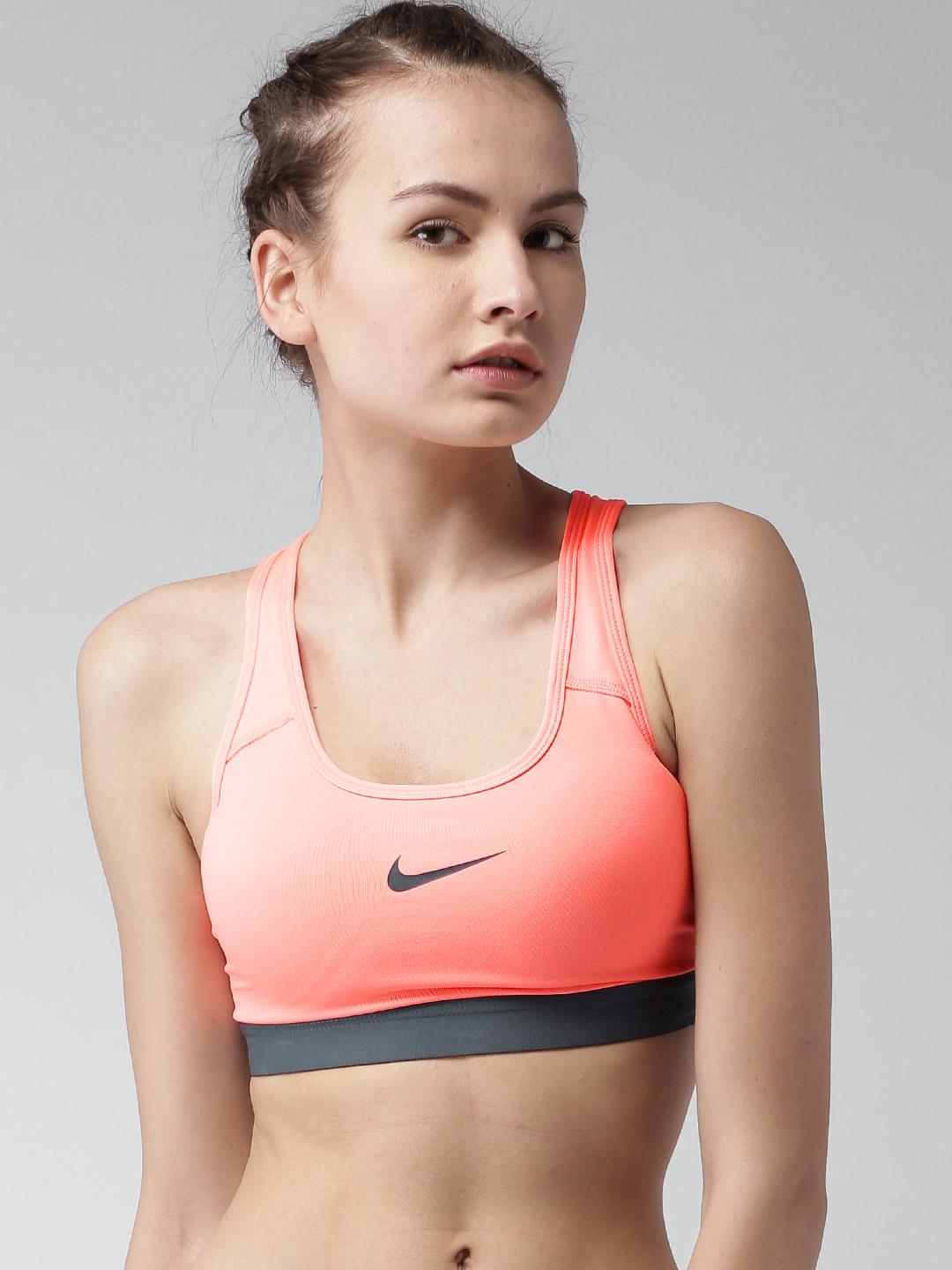 neon pink sports bra nike