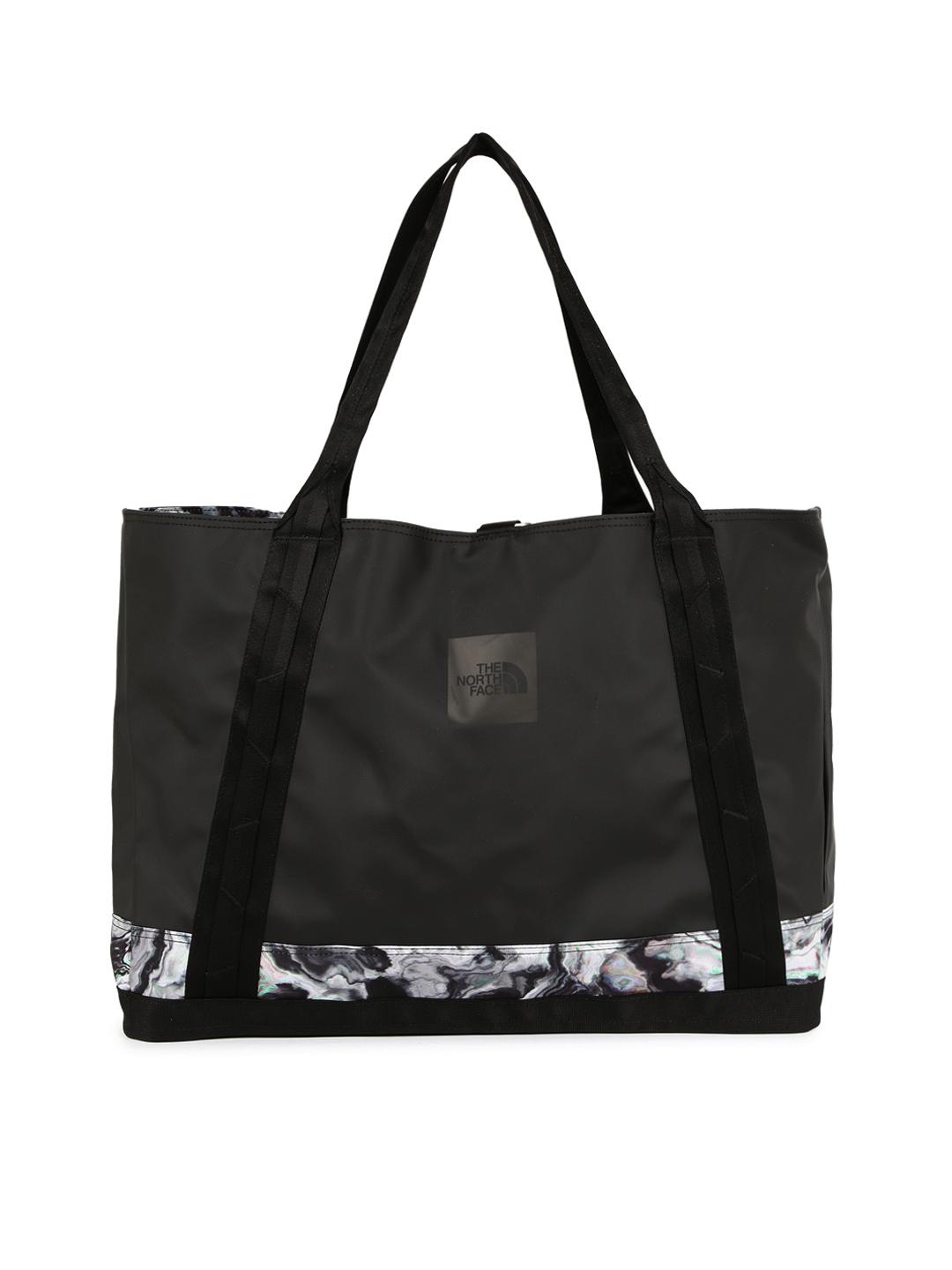 Buy The North Face Black Solid Tote Bag - Handbags for Unisex Buy The North Face Black Solid Tote Bag - Handbags for Unisex