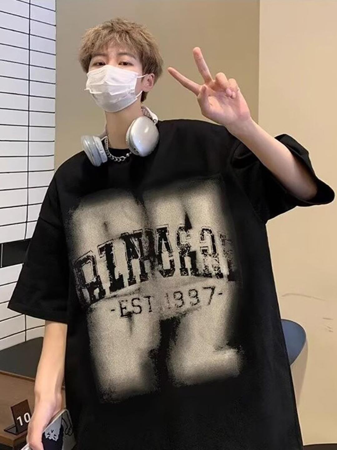StyleCast x Revolte Men Typography Printed Cotton Oversized T-Shirt - Image 1