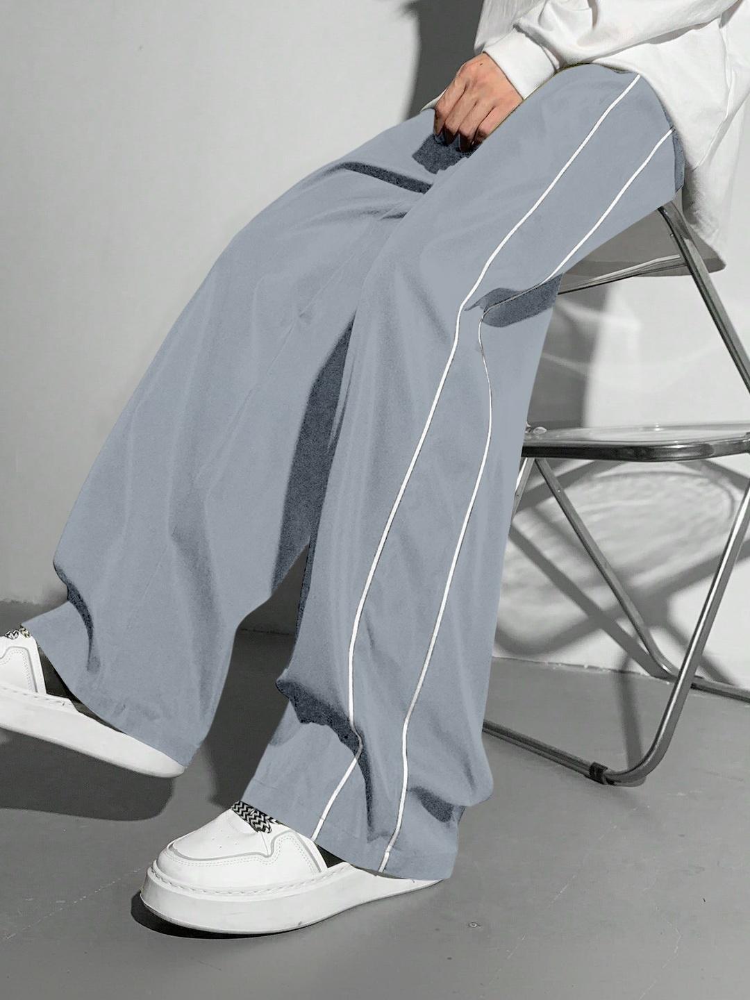 RAJOVATI Men Striped Slim Fit Mid-Rise Track Pant - Image 1
