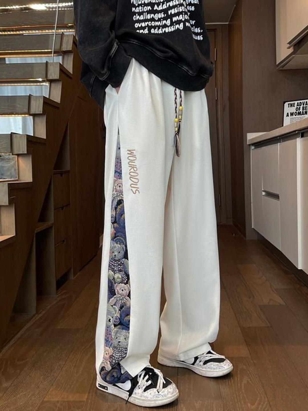 StyleCast X Revolte Men Printed Loose Fit Mid Rise Regular Trousers