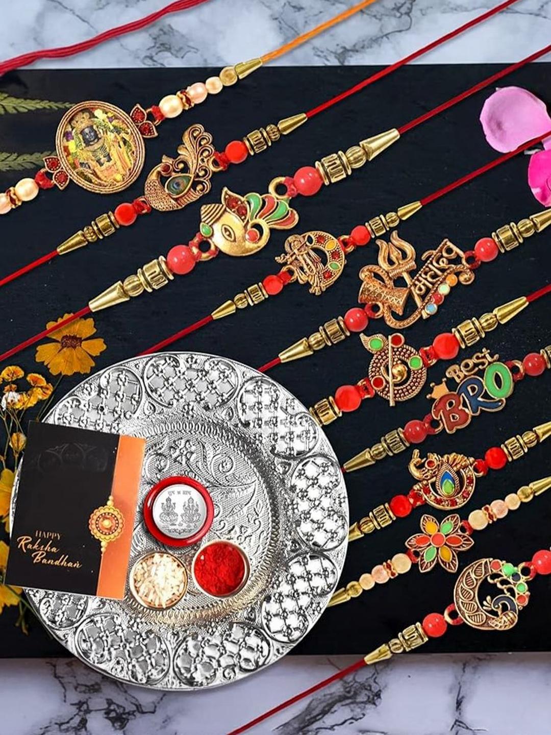 DeoDap Set Of 10 Rakhis With Silver Colour Pooja Thali & Coin- Roli Chawal & Greeting Card