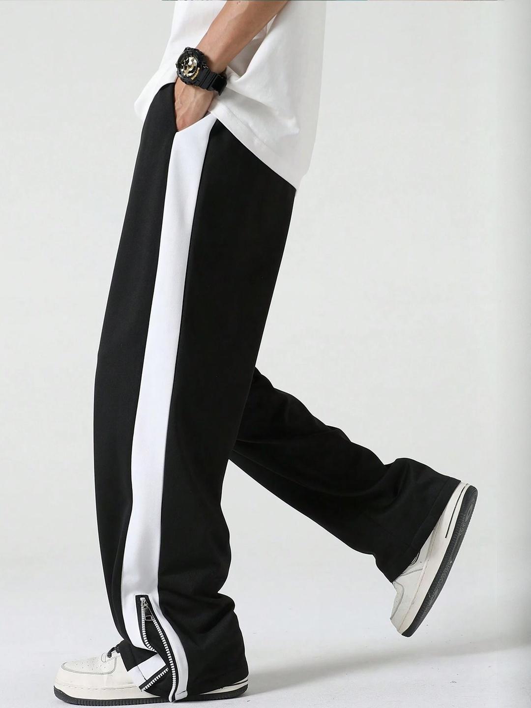 JUMPCUTS Men Mid Rise Colorblocked Baggy Fit Track Pants - Image 1