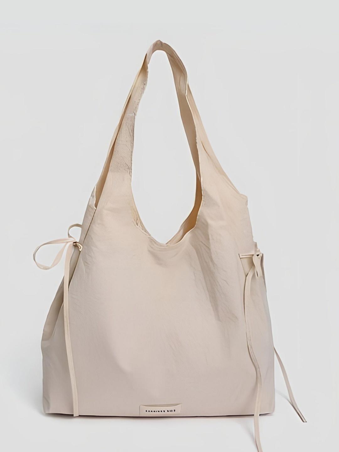 StyleCast x Revolte Structured Hobo Bag