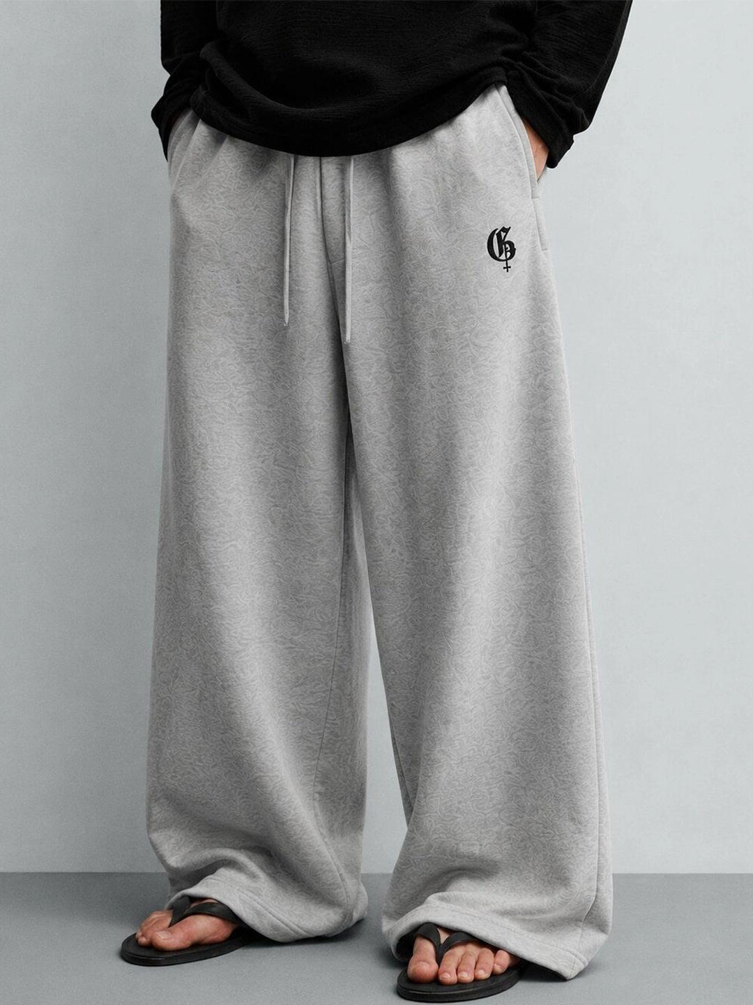 GENRAGE Men Baggy Textured Track Pants - Image 1