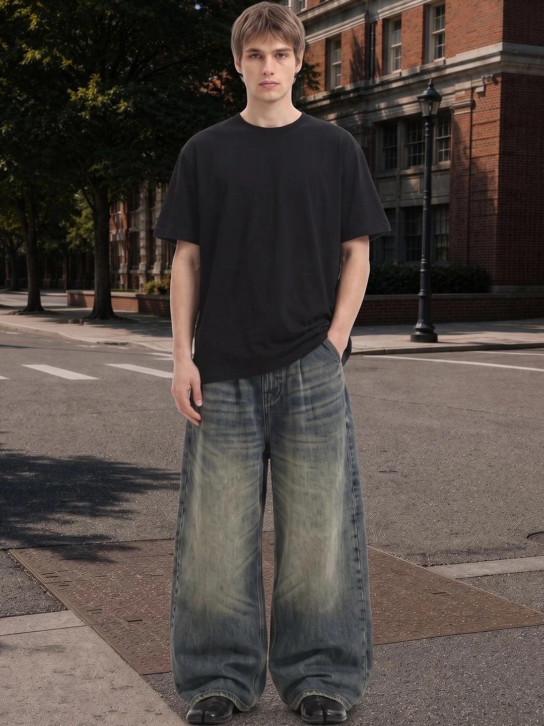 StyleCast x Revolte Men Wide Leg Mid-Rise Light Fade Jeans - Image 1