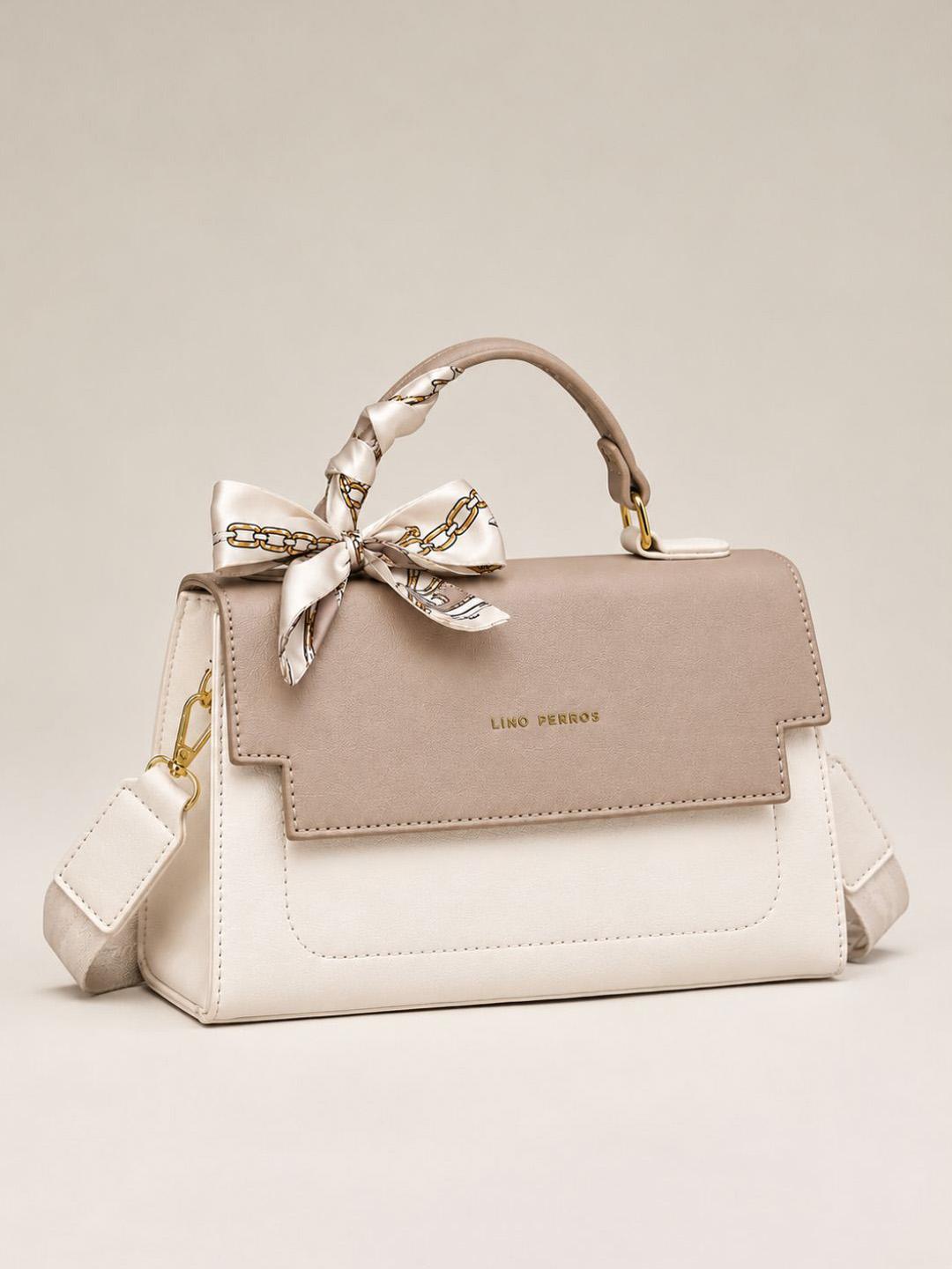 Lino Perros Colourblocked Handheld Bag with Bow Detail - Image 1