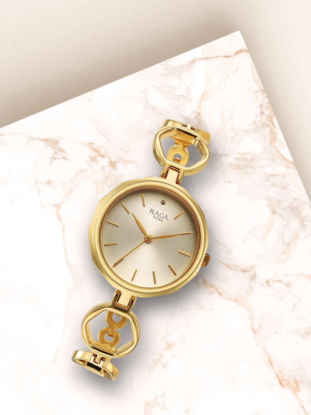 Buy Titan Women Brass Dial Stainless Steel Bracelet Style Straps