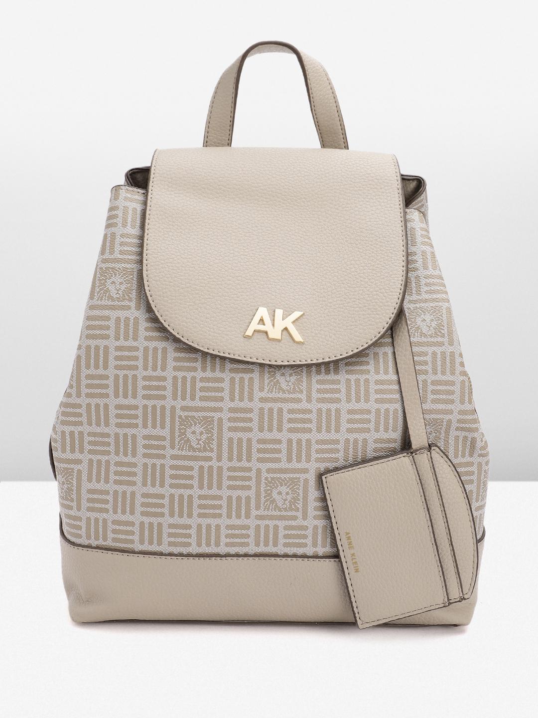 anne klein leather backpack Flap Horsebit Logo Backpack, Cream-Brown/Saddle, Cream-brown/Saddle Fashion This dome crossbody has plenty of interior and exterior pockets to help keep you organized while youre out and about Anne Klein Backpack