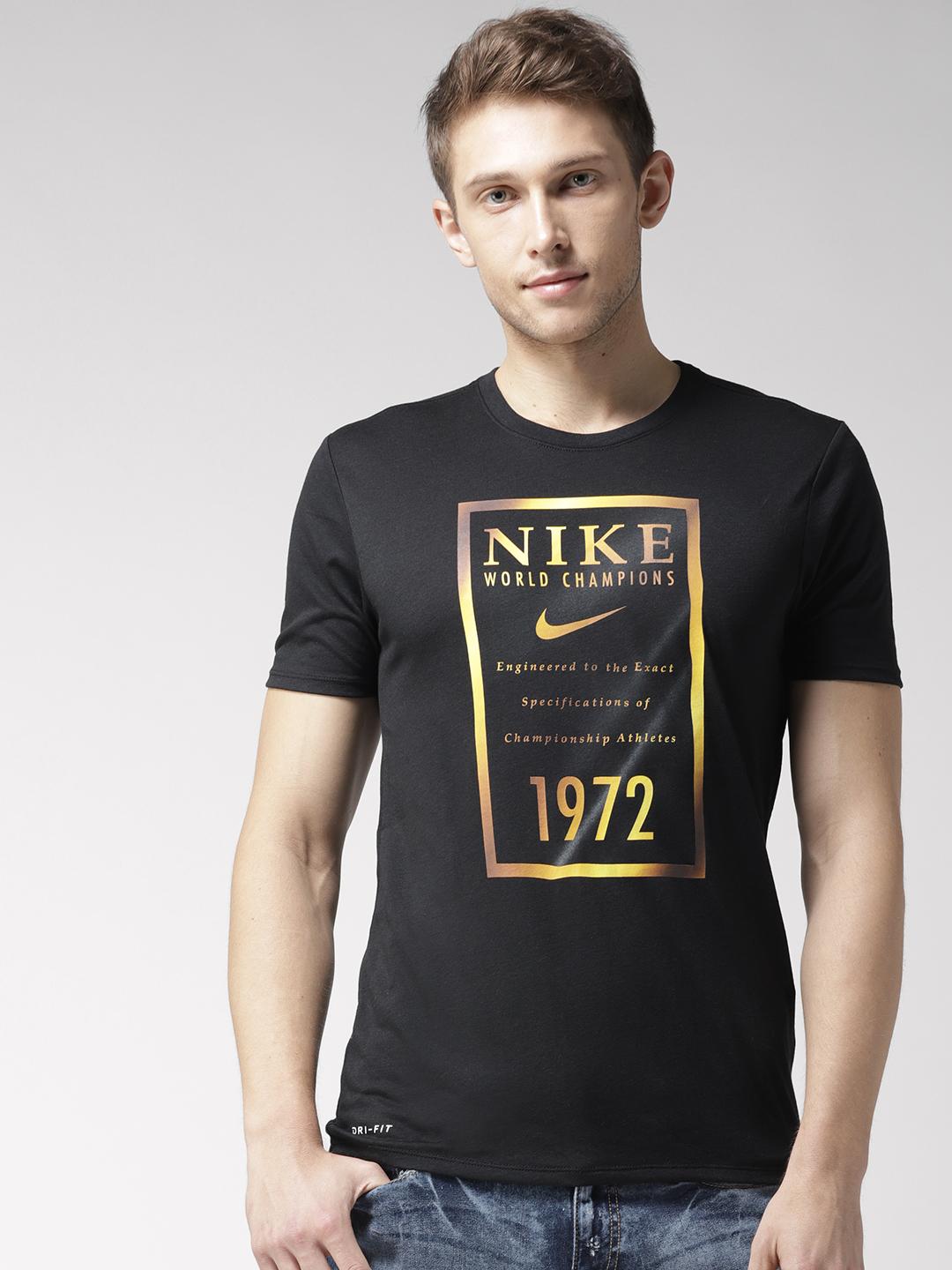 black nike shirt with gold