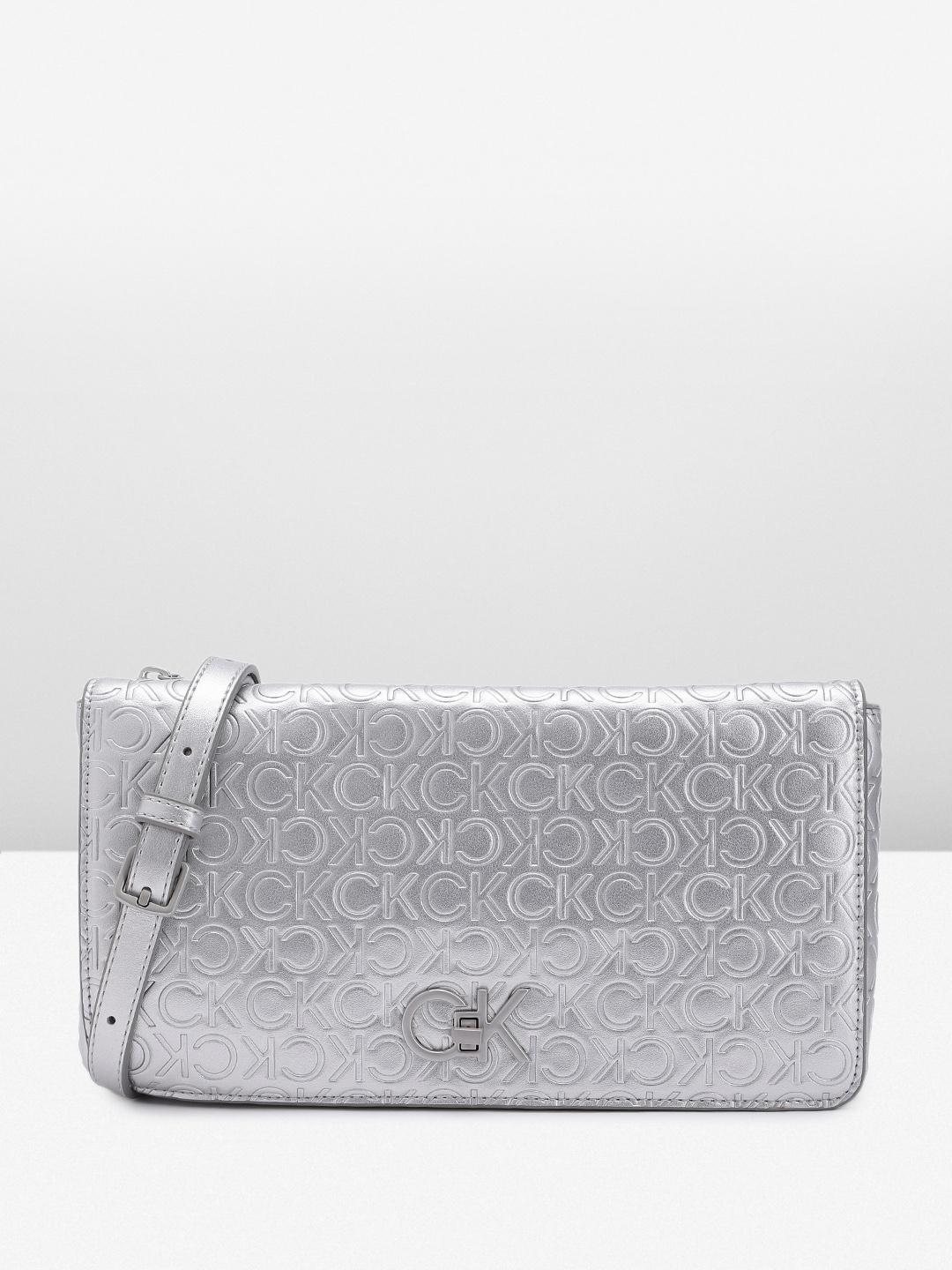 Buy Calvin Klein Women Textured Sling Bag - - Accessories for Women