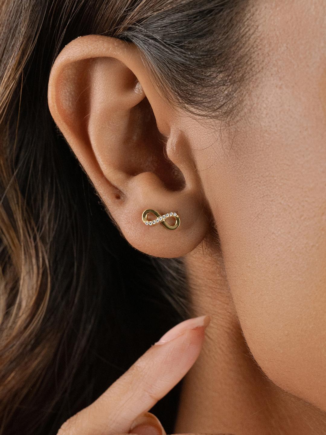 Buy Nistra Women Gold-Plated Cubic Zirconia Infinity Stud Earrings